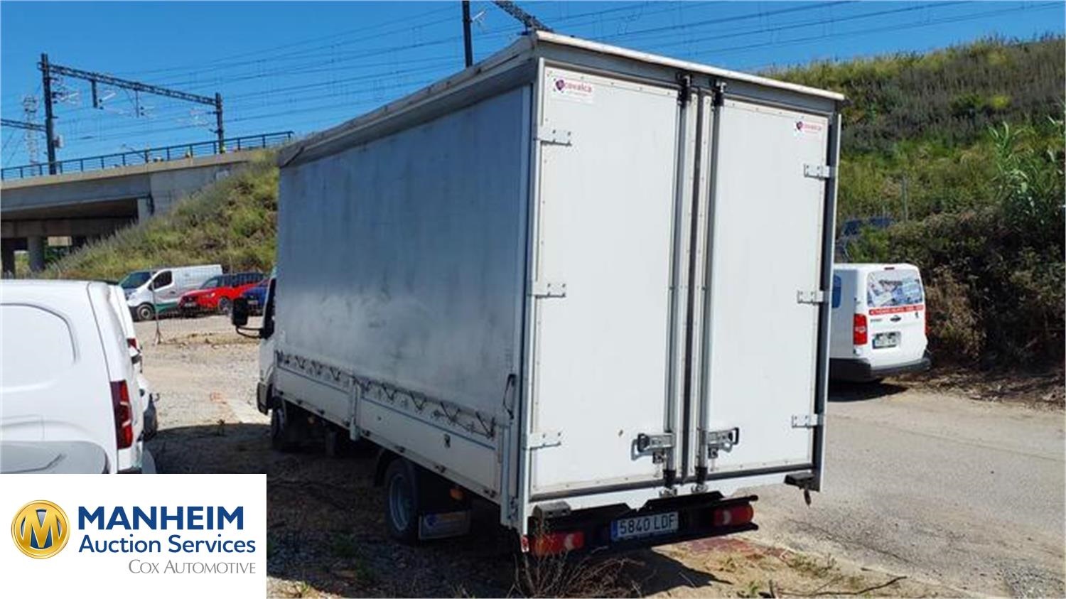 Foto Nissan NT400 12